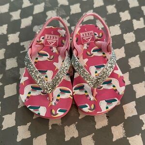 Pink unicorn sparkle flip flops Reef size 3